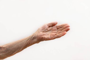 Yaşlı kadının eli. Yaşlı bayan yardım bekliyor. Hafif arka plan ile yaşlı kavramı.