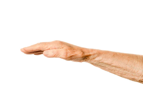 Ramię starszej pani na białym tle. Ręka starszej kobiety z otwartą dłonią — Zdjęcie stockowe