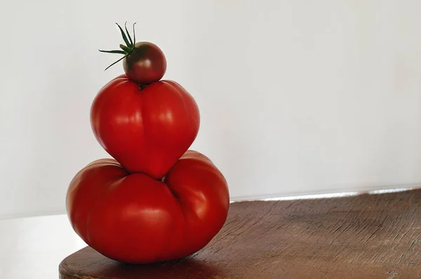 Tomato pyramid on a white background.