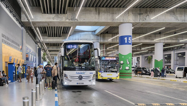 Turkey. Istanbul. July 5, 2019. Bus station at the new airport. People board a bus on the lower floor of the terminal