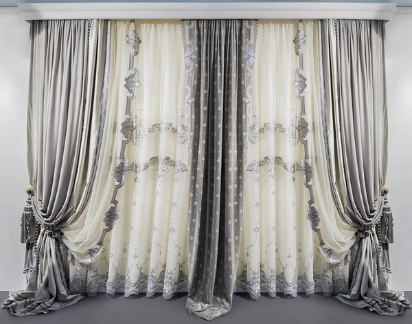 Modern interior design in the gray white colors. Straight velvet curtains and translucent tulle with embroidery — Stock Photo, Image