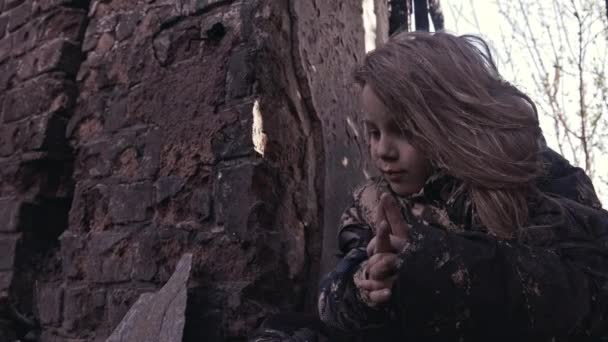 Little Dirty Homeless Girl Praying Abandoned Building — Stock Video