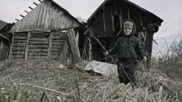 Homeless Dirty Boy Playing Sticks Abandoned Village — Stock Video