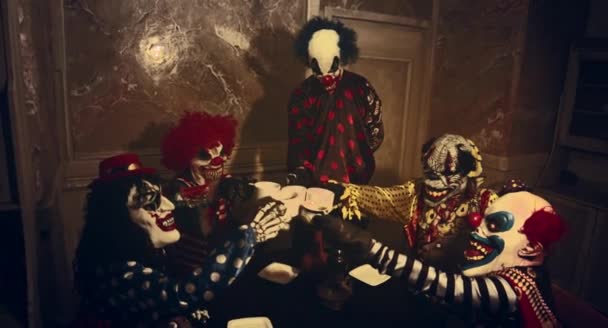 Scary Clowns Having Halloween Tea Party Dark Decorations — Stock Video