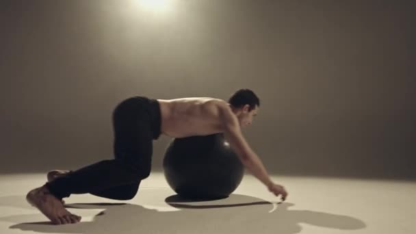 Young Man Dancer Making Exercises Yoga Ball Studio — Stock Video