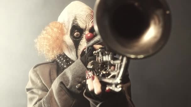 Scary Clown Playing Trumpet Misty Background — Stock Video