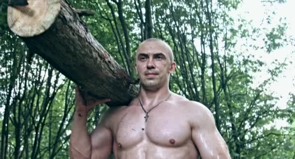 Muscular Caucasian Man Holding Log Forest — Stock Video