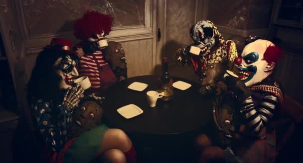 Scary Clowns Having Halloween Tea Party Dark Decorations — Stock Video