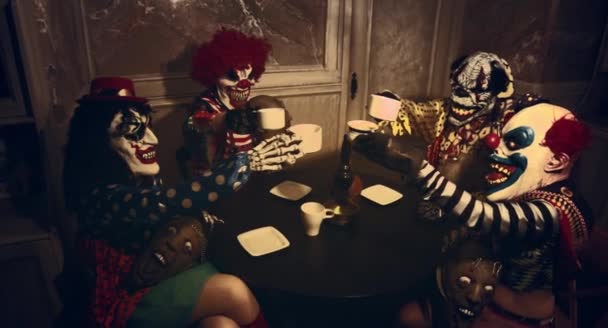 Scary Clowns Having Halloween Tea Party Dark Decorations — Stock Video