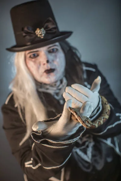 Image result for scary snake man in top hat