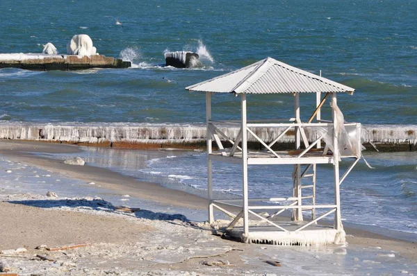 Abandoned Rescue Station. Beach tower on the Black Sea in winter