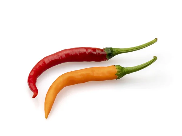 Twee Chili pepers. Eten op een witte achtergrond. — Stockfoto