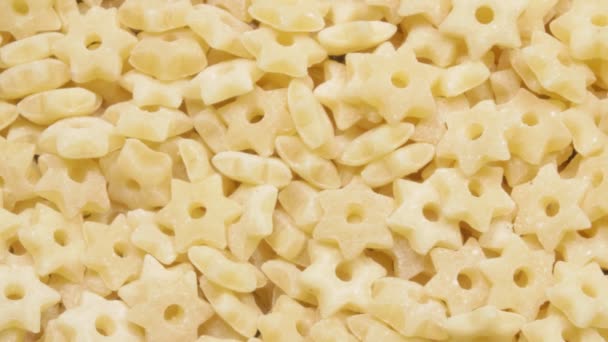 Pasta da primo piano. Un sacco di asterischi. Macro video. — Video Stock