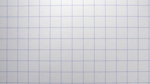 Książka z ćwiczeniami w klatce. Notatnik szkolny. Białe pole o geometrycznym wzorze. — Wideo stockowe
