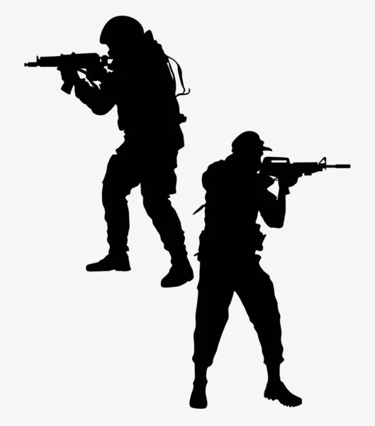 Vector silhouettes of soldiers — Stock Vector