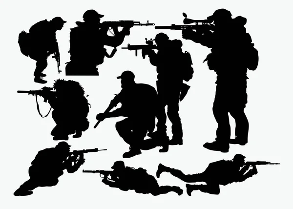 Silhouettes of soldiers — Stock Vector