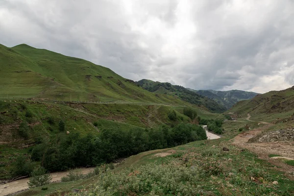 Mountain Landscape With A River. Panorama of a mountain river.