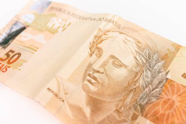 Brazilian Real banknote on white background. Brazilian economy and finance concept 