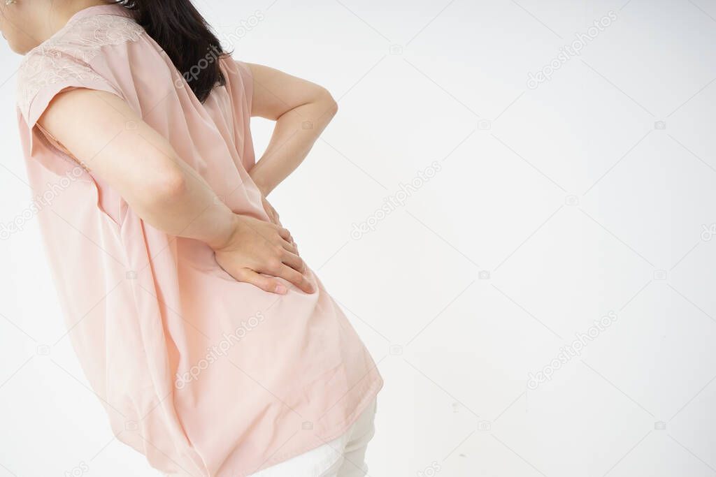 Young woman have a back problem