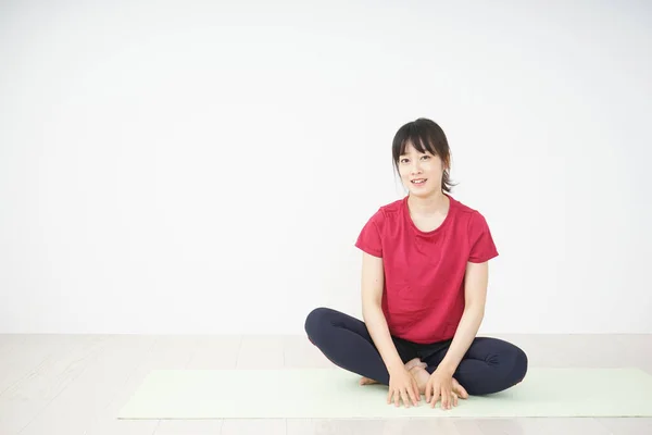 Young Woman Stretching Home — Stock Photo, Image