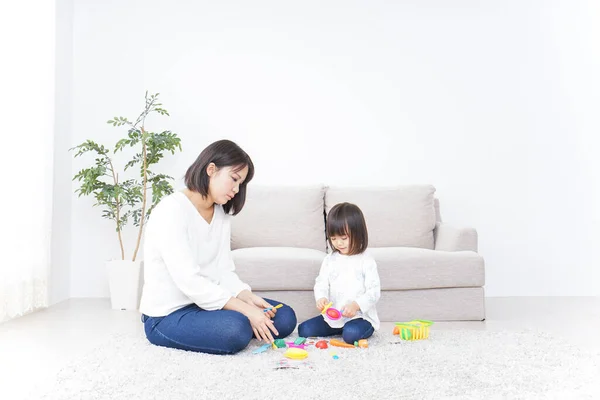 Madre Hijo Jugando Con Juguetes Alfombra — Foto de Stock