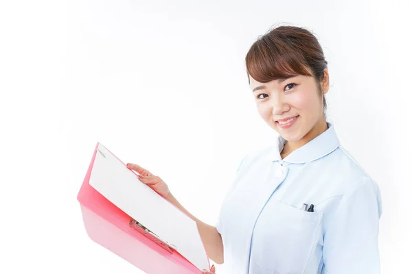 Junge Asiatische Krankenschwester Hält Ordner — Stockfoto