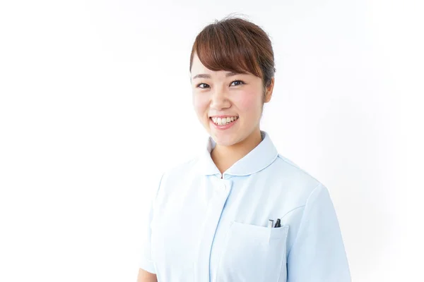 Junge Krankenschwester Posiert Auf Weißem Hintergrund — Stockfoto