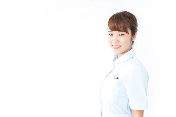 Joven Enfermera Posando Sobre Fondo Blanco —  Fotos de Stock