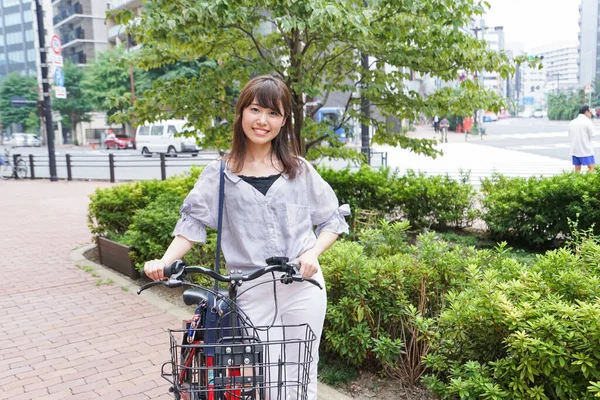 Young Asian Woman Pushing Bike — Stock Photo, Image