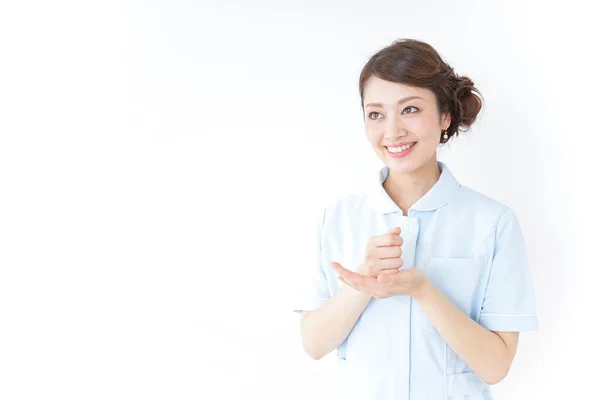 Uniformed Young Asian Nurse — Stock Photo, Image