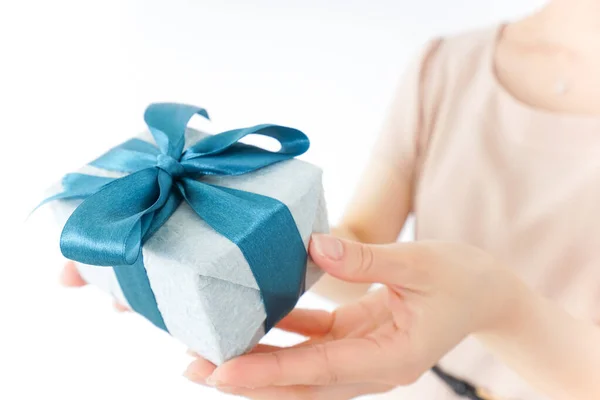Woman Holding Gift Box Blue Ribbon Stock Photo