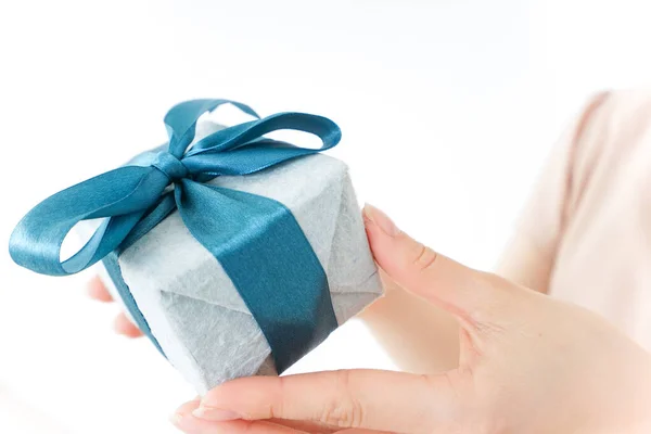 Woman Holding Gift Box Blue Ribbon Royalty Free Stock Images