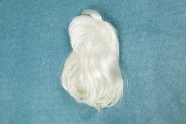 Wig on carpet — Stock Photo, Image
