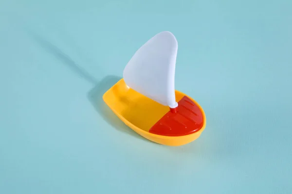 Boat toy lost at sea — Stock Photo, Image