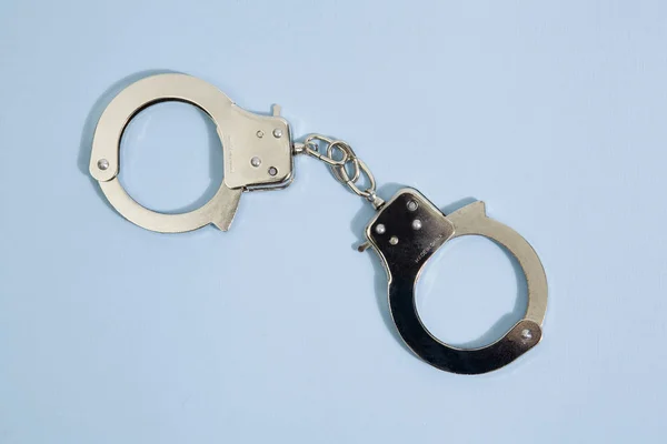 Pop handcuffs — Stock Photo, Image
