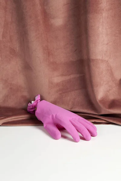 Velvet pink gradient plastic glove — Stock Photo, Image