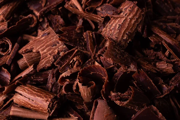 Çikolata bukleler. Arka plan kahverengi gıda makro.