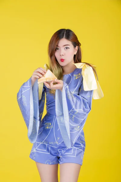 Fashion Girl Dress Hand Gesture Eat Milk Yellow Background — ストック写真