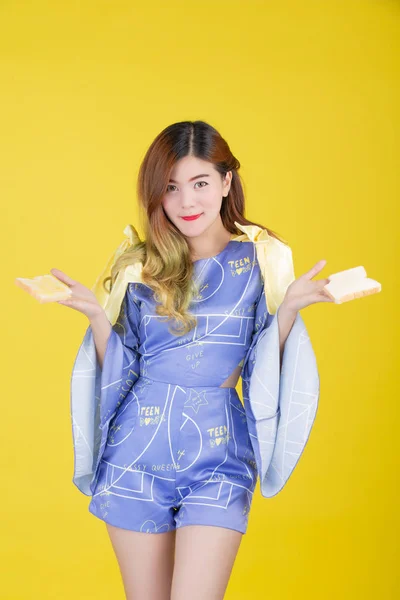 Fashion Girl Dress Hand Gesture Eat Milk Yellow Background — ストック写真