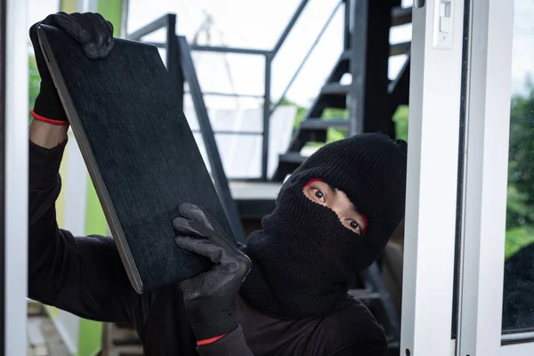 Thieves Wear Black Hats Pry Windows Steal Things — Stockfoto