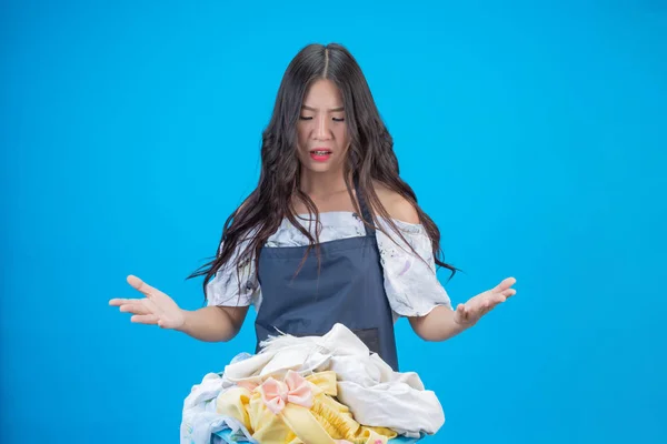 Beautiful Woman Holding Cloth Prepared Wash Blue Background — Stok Foto