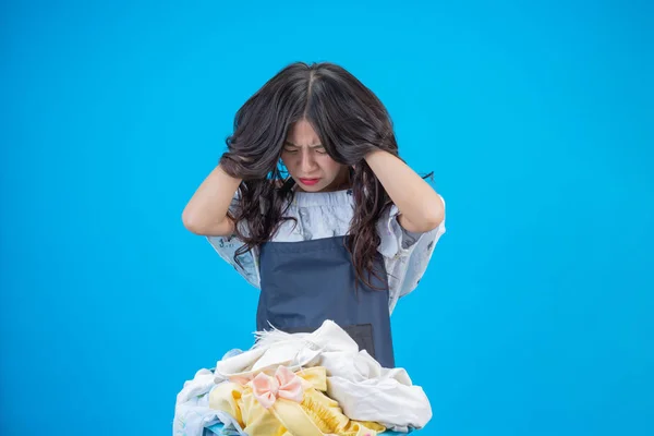 Beautiful Woman Holding Cloth Prepared Wash Blue Background — Stockfoto