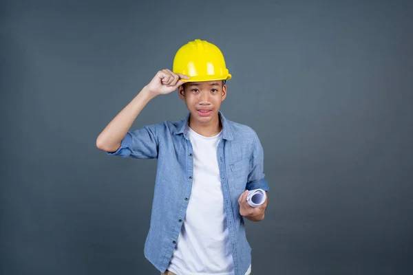 Construction Male Teens Holding White Paper Gray Background — Foto de Stock