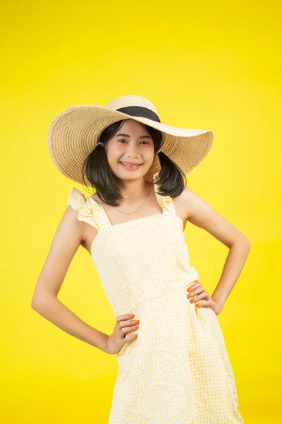 Beautiful Cheerful Young Woman Big Hat Yellow Background — Foto de Stock