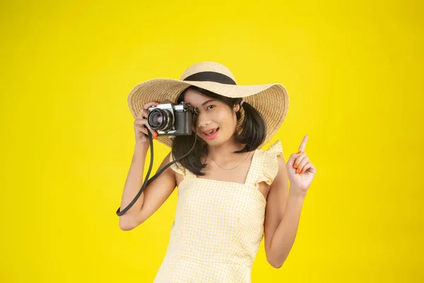 Beautiful Happy Woman Wearing Big Hat Camera Yellow Background — стоковое фото