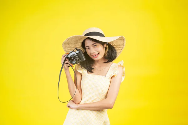 Beautiful Happy Woman Wearing Big Hat Camera Yellow Background — Zdjęcie stockowe