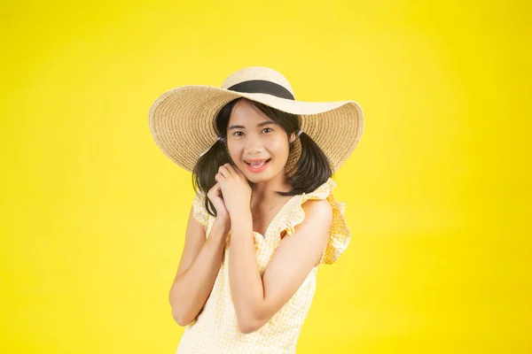 Beautiful Happy Woman Wearing Big Hat Showing Cheerfulness Yellow Background — Fotografia de Stock