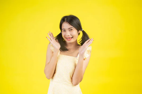 Beautiful Woman Who Happy Showing Various Gestures Yellow Background — 图库照片