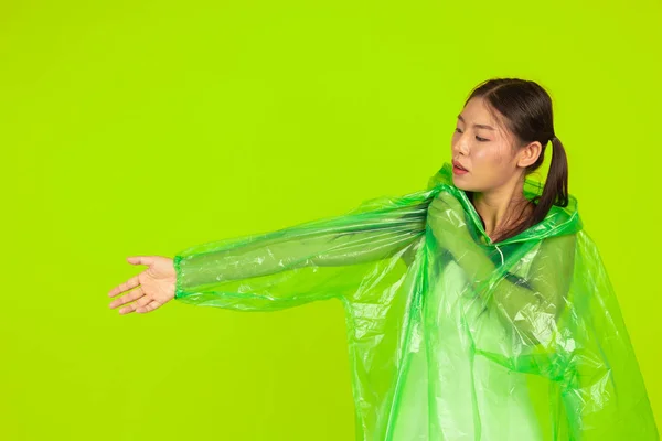 Girl Wearing Green Rain Dress Green Background — Foto de Stock