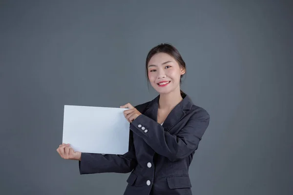 Office Girl Holding White Blank Board Gray Background — 图库照片